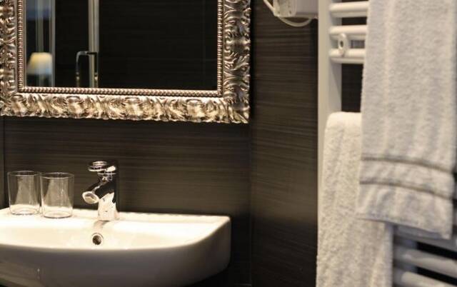 Badkamer van een tweepersoonskamer van C-Hotels Club in Florence