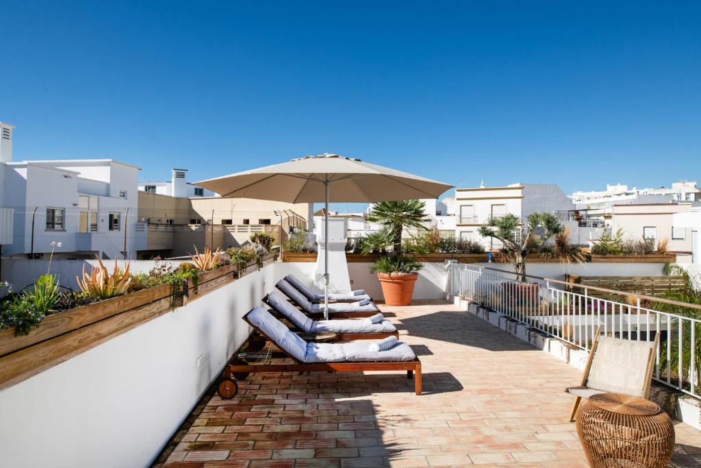 Casa Rosa Villa - dakterras met ligbedden