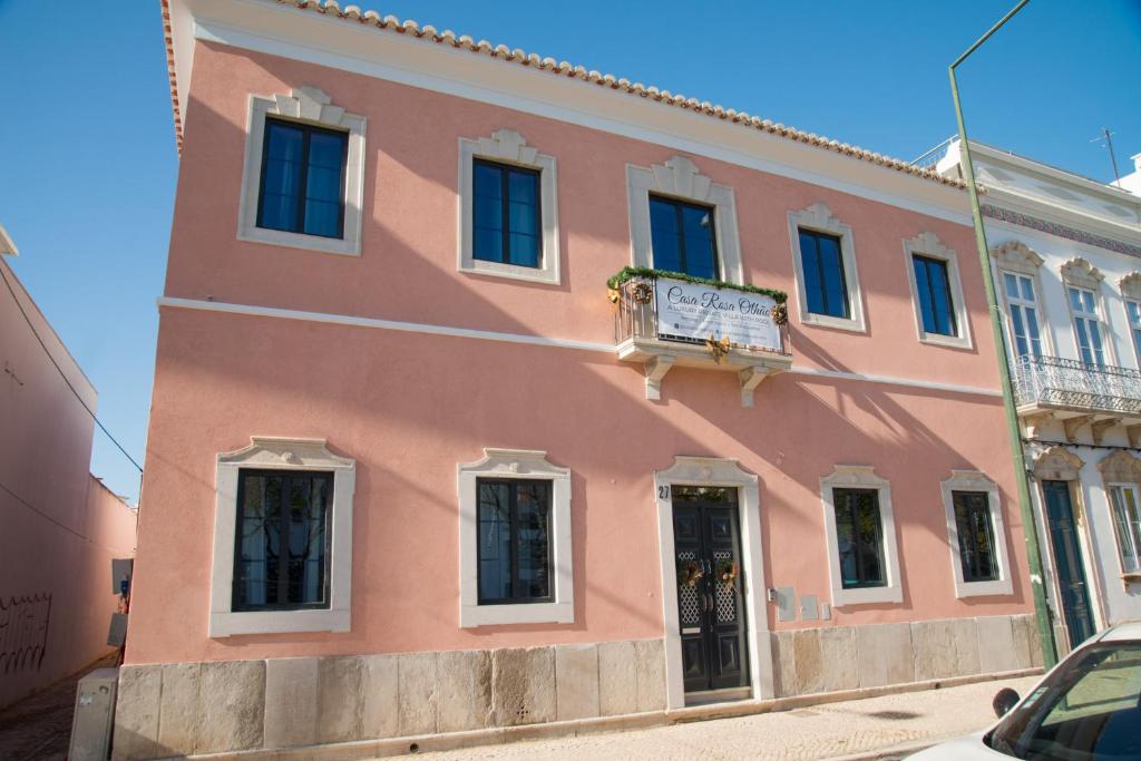Casa Rosa Villa - roze gevel van het hotel