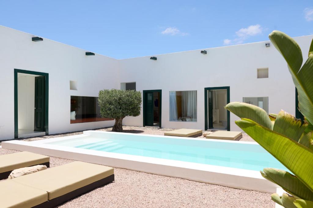 Casa Montelongo - zwembad met patio