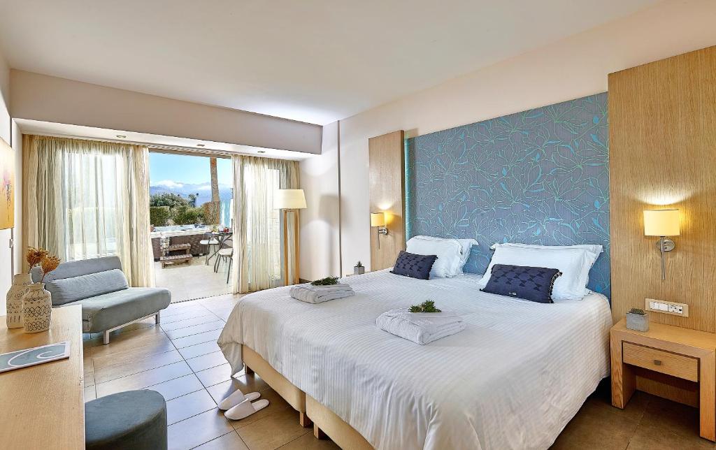 Castello Boutique Resort en Spa - kamer met terrasdeuren