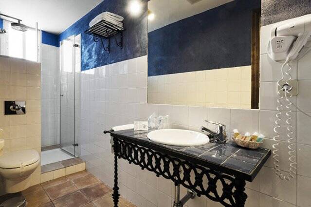 Badkamer van Hotel Oasis